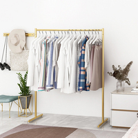 Étagère de présentation moderne en métal doré pour magasin de vêtements, 120*130cm
