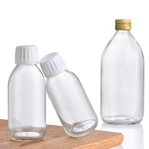 30ml 60ml 100mL 125ml 150ml 200ml 250ml Medicina Mini Round Spirit Licor <span class=keywords><strong>Jengibre</strong></span> Botella <span class=keywords><strong>de</strong></span> vidrio con tapa <span class=keywords><strong>de</strong></span> rosca <span class=keywords><strong>de</strong></span> metal Ropp - Product Image 2