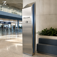 Colonne de signalisation sculptée autoportante en acier inoxydable, finition brossée, pour hôtels, centres commerciaux, aéroports et halls d'entreprises modernes
