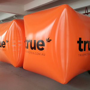 Cubo Inflable de Proteína Verdadera Naranja, Flotador Publicitario Impermeable para Uso en Exteriores - Product Image 1