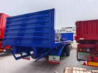 Semi-remorque de transport de marchandises 40 pieds, 3 essieux, 60 tonnes, avec suspension à ressorts et panneau avant, garantie de satisfaction, pour le transport de marchandises irrégulières