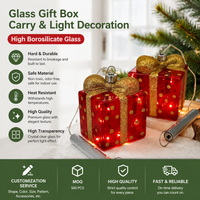 Lampe portable en forme de boîte cadeau de Noël, fournisseur de marque privée, ODM, guirlande lumineuse LED, décoration de fêtes, verre borosilicate rouge et or, vente en gros