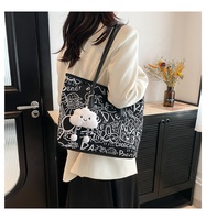 Graffiti toile sac pour femmes 2025 nouvelle mode sac à bandoulière grande capacité sac fourre-tout avec pendentif