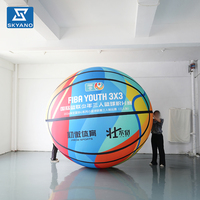 Modèle publicitaire géant gonflable personnalisé de ballon de basket simulé pour la promotion d'événements sportifs en extérieur et la décoration publicitaire commerciale