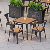 Ensemble de table à manger moderne et décontracté en bois massif de style industriel avec chaise en fer pour petits appartements, restaurants et hôtels