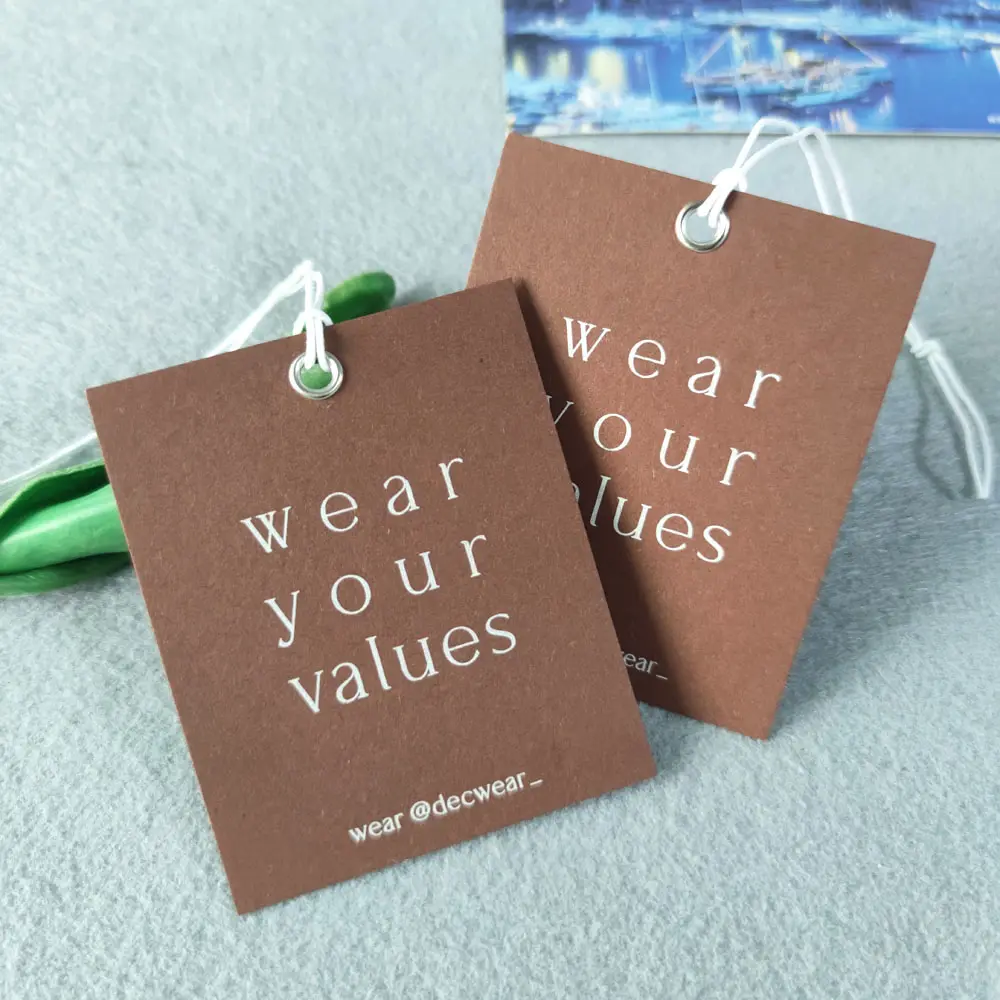 Hot Sale Customized Luxury Embossed Custom Label Recycled Hang Tag Cardboard Brand Hangtags For Clothing Own Logo Tags