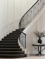 Escalier rotatif moderne sur mesure avec rampes en fer forgé pour hôtels et villas