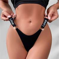 Culotte string taille basse sans couture respirante style européen avec imprimé lettres noires, anneau métallique en O et fines bretelles ajustables