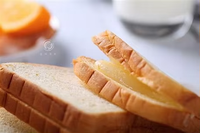 Machine à trancher le pain automatique à haut rendement ADMF pour la transformation du pain de mie, des sandwichs et des pains entiers