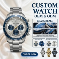 Jam Tangan Kronograf Baja Tahan Karat Perak dengan Dial Putih, Sub Dial Biru, Bezel Biru, dan Tali Terintegrasi