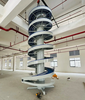 Tour de convoyeur à spirale verticale personnalisée, élévateur modulaire en plastique à chaîne spirale pour bouteilles d'huile comestible et boîtes en carton