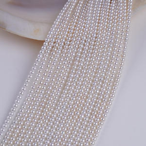 Fabricants de Zhuji, vente en gros de petites perles d'eau douce naturelles de 3 à 3,5 mm, perles colorées en chaîne pour accessoires de bijoux DIY - Product Image 1