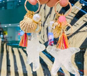 Creativo estilo europeo borlas llavero dibujos animados estrella de mar resina colgantes acrílico plástico coche llave accesorios bolsa colgantes - Product Image 5