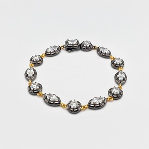 Bracelet à maillons statement en argent sterling 925 plaqué bronze avec zircone cubique à taille mixte - Product Image 1