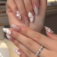 Lot de 24 faux ongles de luxe rouges en forme d'amande avec nœud papillon, pour salon de manucure, à presser, style modèle, pour pose DIY