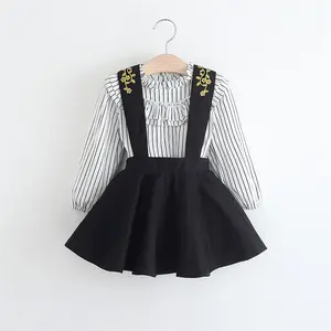 Ropa de EE. UU. Importaciones de ropa de larga duración Diseño de bordado de Hong Kong para ropa de bebé Niñas negras en minifaldas