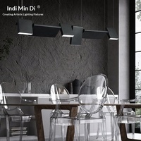 Luminaire suspendu minimaliste créatif postmoderne pour restaurant, bar ou comptoir, long et élancé.