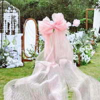 Grand nœud en organza rose de luxe pour la décoration visuelle des vitrines et des événements