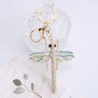Porte-clés en métal avec strass en cristal, motif libellule, breloque décorative pour sac