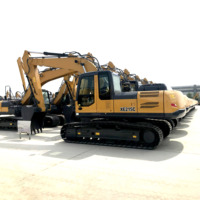 Excavatrice sur chenilles XE215C avec une puissance de 128,5 kW et une benne de 1 m³ pour la manutention des matériaux