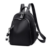 Sac à dos en nylon imperméable tendance et élégant pour femmes de bureau, convertible en sac à bandoulière, avec fermeture éclair et doublure en polyester – Collection 2026 à succès