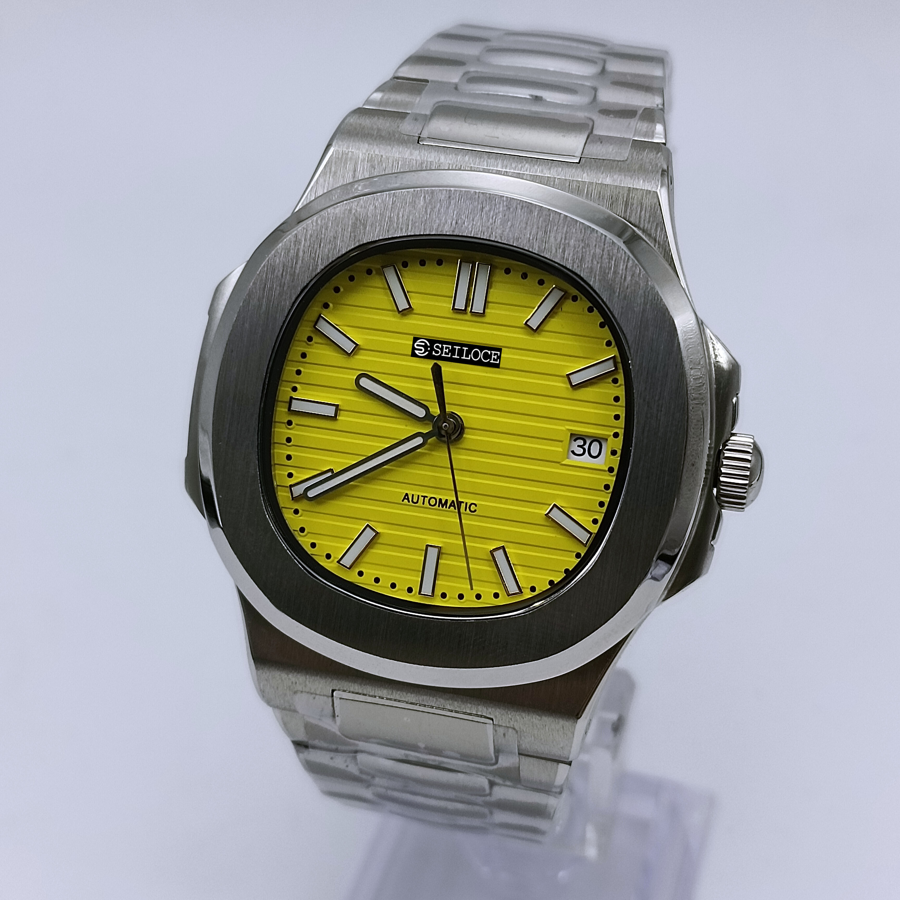 Boîtier argenté + cadran jaune