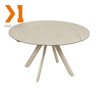 Table à manger ronde extensible moderne avec plateau en pierre frittée de travertin blanc et base de pieds crème, design minimaliste pour salle à manger à domicile
