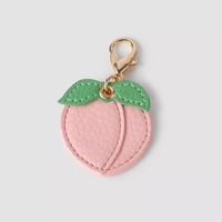 Joli porte-clés tendance en cuir PU en forme de fruit coloré, breloque de sac brodée pour la vente au détail