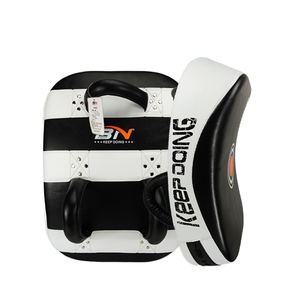 แผ่นรองขาสำหรับเตะ BN Wholesale Rubber Leg Kick Pads สำหรับมวยไทย เทควันโด ซานด้า แผ่นป้องกันการเตะ - Product Image 1
