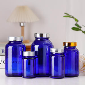 75ml 150ml 500ml Salud Cápsula Porción Botella de vidrio Venta al por mayor Cápsula azul sellada Medicina a prueba de luz Píldora Botella de vidrio - Product Image 3