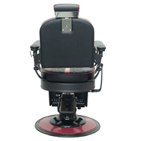 Sillón de Barbería Moderno con Costuras Rojas, Reposacabezas Ajustable y Marco Metálico Negro Decorativo para Salón de Belleza Masculino de Alta Gama