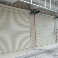 Volets roulants électriques en acier inoxydable sur mesure de Foshan, Chine, pour les magasins, les centres commerciaux, les usines industrielles, les portes coupe-feu