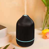 Diffuseur d'huiles essentielles électrique pour la maison, diffuseur d'arômes ultrasonique, machine à parfum d'ambiance, humidificateur avec lumière de 7 couleurs
