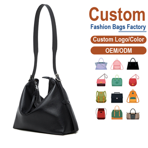 กระเป๋าสะพายไหล่หนังแท้สีดำสไตล์คลาสสิกสำหรับผู้หญิง ทนทาน หนังวัวแท้ลายเม็ดละเอียด ป้องกันการโจรกรรม ความจุ 8 ลิตร เหมาะสำหรับใช้ในออฟฟิศและลำลอง ขายส่ง - Product Image 1