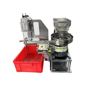 Customized vibratory bowl feeder with insert mechanism for pin