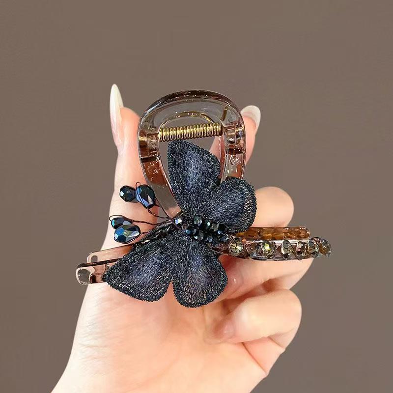 Mariposa bordada negra