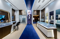 Vitrine d'exposition de montres classique de luxe avec éclairage LED, en verre trempé et métal, pour les boutiques de vente de montres traditionnelles