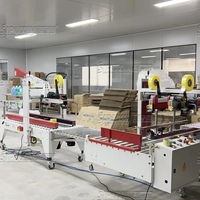 Machine d'emballage et de scellage automatique de cartons en papier d'usine d'origine, haute efficacité, fonctionnement facile, machine de levage de cartons