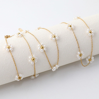 Chaînes de corps, de taille et de ventre pour femmes en acier inoxydable plaqué or 18 carats avec perles d'imitation et motif floral, style délicat, collier et bracelet, bijoux