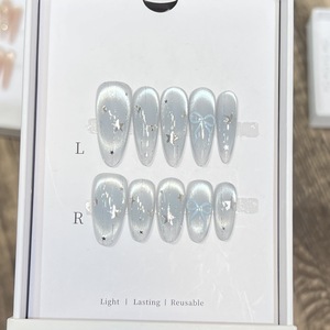 TSZS 10 pièces Faux ongles à presser faits main style français Amande, <span class=keywords><strong>bleu</strong></span> clair effet œil de chat avec nœud, pointes d'ongles artificielles portables, vente en gros - Product Image 1