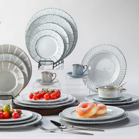 Service de table en céramique bleu et blanc de luxe ST, design à pois et lignes, porcelaine, style moderne, durable, pour mariage et réceptions.