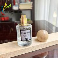 Bouteilles de parfum cylindriques en verre gravé à l'acide de 50 ml, à pulvérisation fine, avec vaporisateur doseur, en gros, en stock chez le fabricant