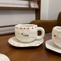 Ensemble de soucoupes tasses à thé en céramique rétro modernes de luxe léger peintes à la main de grande valeur de beauté pour le petit-déjeuner en céramique moderne peinte à la main