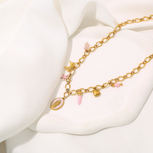 Collier en acier inoxydable plaqué or pour femme décoré <span class=keywords><strong>de</strong></span> breloques roses comme un cœur d'étoile <span class=keywords><strong>de</strong></span> mer et une Vierge <span class=keywords><strong>Marie</strong></span> - Product Image 2