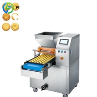 Machine à fabriquer des biscuits et machine d'emballage pour biscuits durs