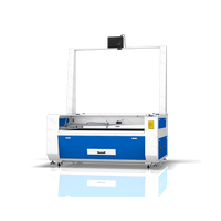 Système laser pour tissus avec positionnement par projecteur visuel pour la fabrication d'enseignes, la décoration de meubles et la production artisanale sur mesure