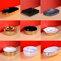 Vasque à poser ronde en céramique de luxe dorée, finition électrolytique, pour lavabo moderne, de l'usine de Chaozhou