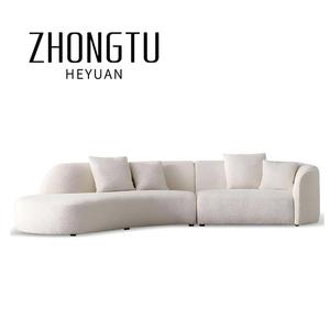 โซฟาผ้าบุคล้ายขนแกะ รุ่นโมเดิร์น คอมฟอร์ท 3-4 ที่นั่ง สีขาว สำหรับห้องนั่งเล่นในร่ม รูปทรงตัวแอล ดีไซน์โค้งมน เหมาะสำหรับโรงแรม - Product Image 1