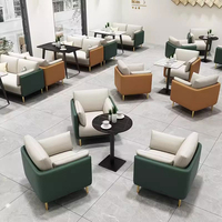 Fauteuil de café commercial décontracté, chaise de salon pour pâtisserie, table et chaises pour espace de repos, table et chaises pour bar à livres, ensembles de table et chaises pour négociation en salon de thé.