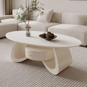 Mesa de Centro Ovalada Color Crema con Superficie de Resina, Mueble Moderno para Sala de Estar, Ideal para Apartamentos Pequeños - Product Image 1